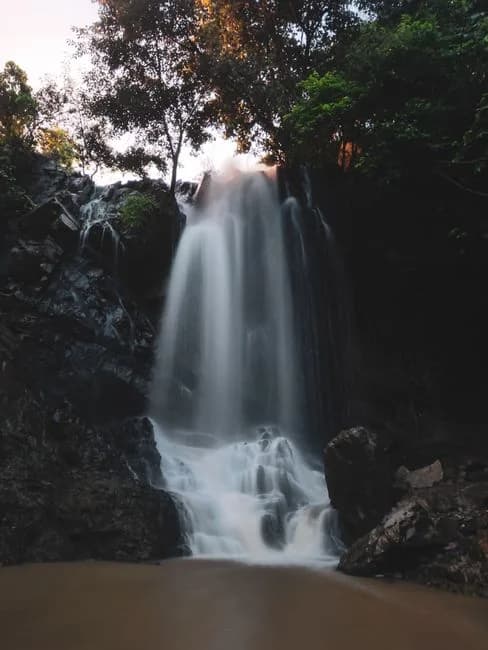 Waterfall in Ranchi Jharkhand India surrounded by lush green forest