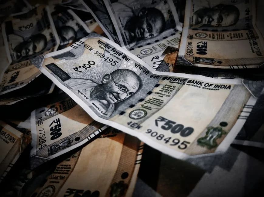 Stack of Indian rupee notes representing real money gaming stakes