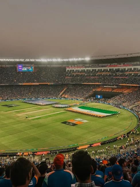 Vibrant IPL cricket match at Narendra Modi Stadium with a packed crowd in Ahmedabad India