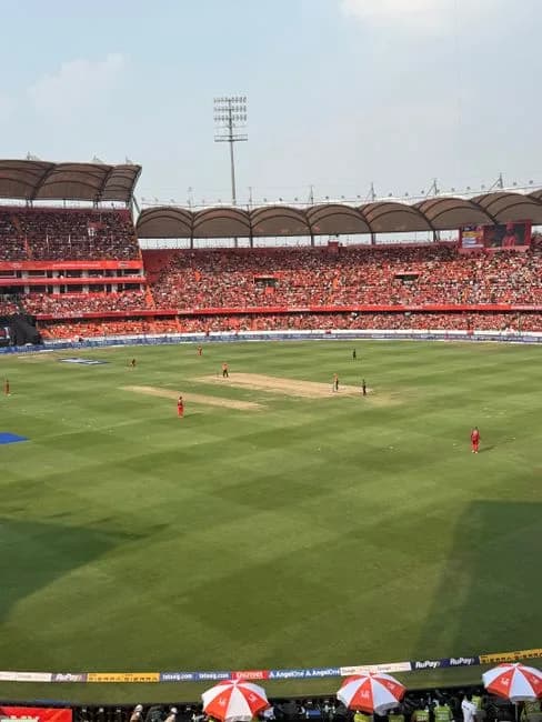 Exciting daytime cricket match in a packed stadium in Hyderabad India